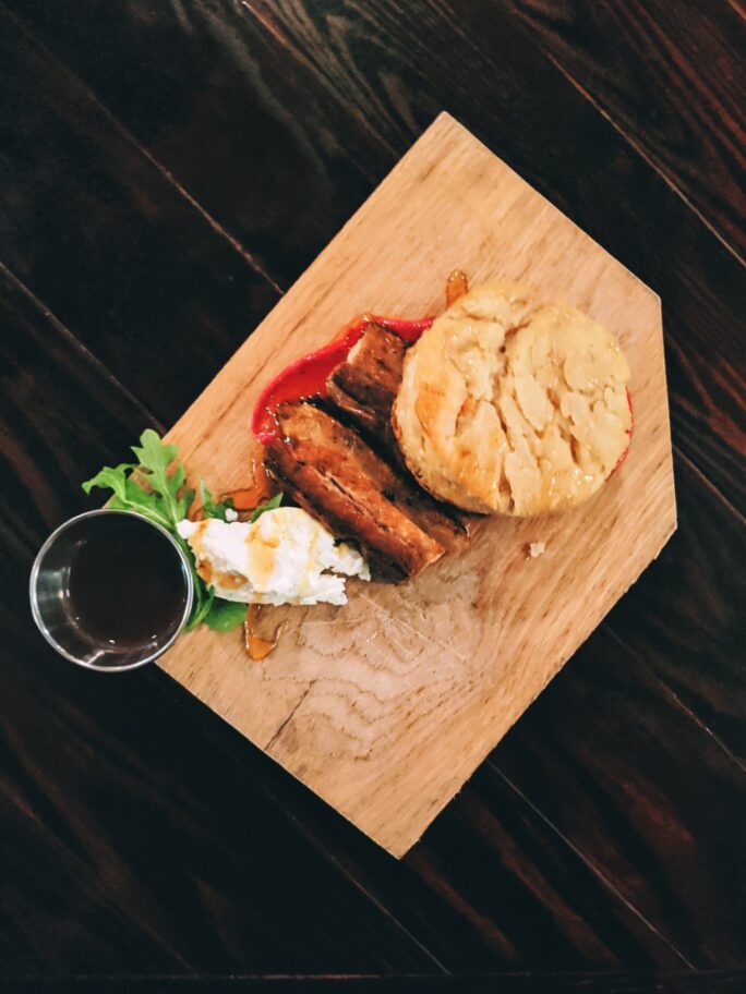 Pork belly and a giant biscuit over jam with butter and honey. This is heaven