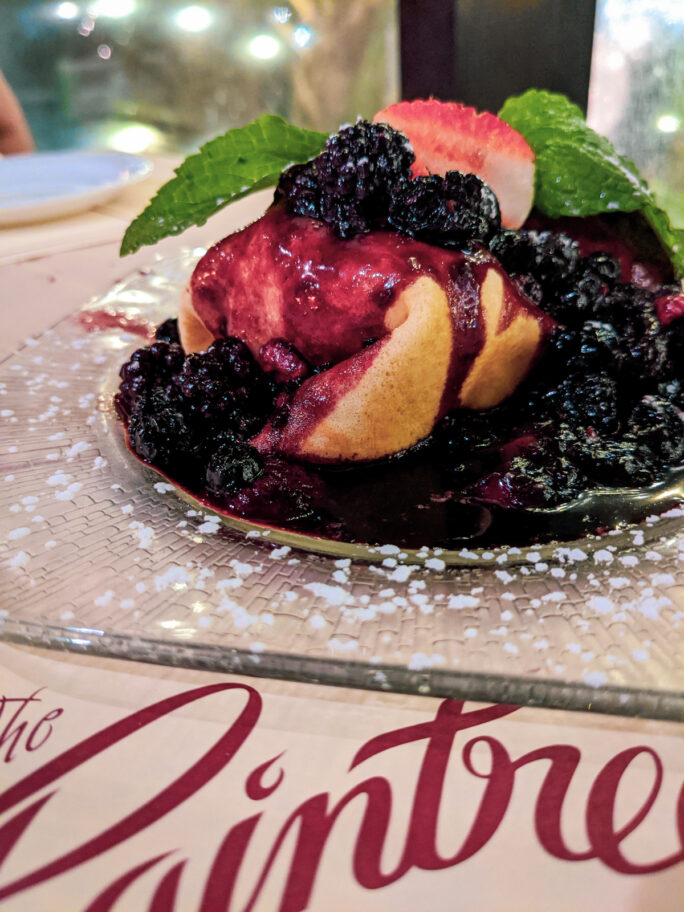 Massive berry filled crepes you do NOT want to miss at the Raintree restaurant 