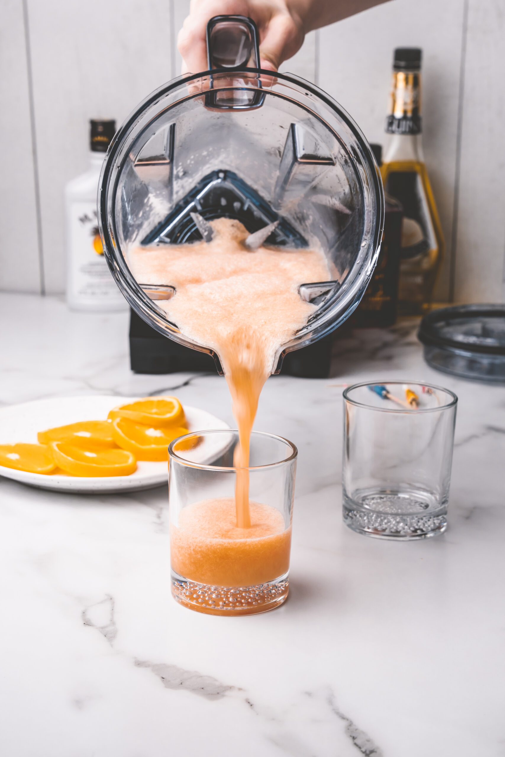 Frozen drink pouring into a glass. 