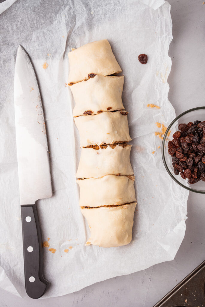 slicing loaf of dough