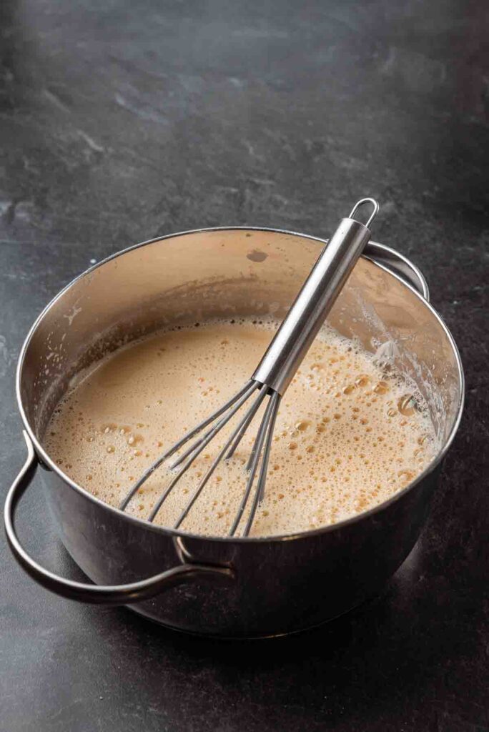 mixing wet ingredients in a metal pot