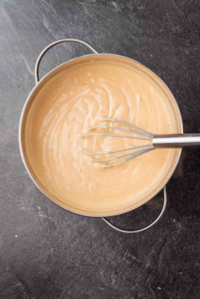 mixing wet ingredients in a metal pot