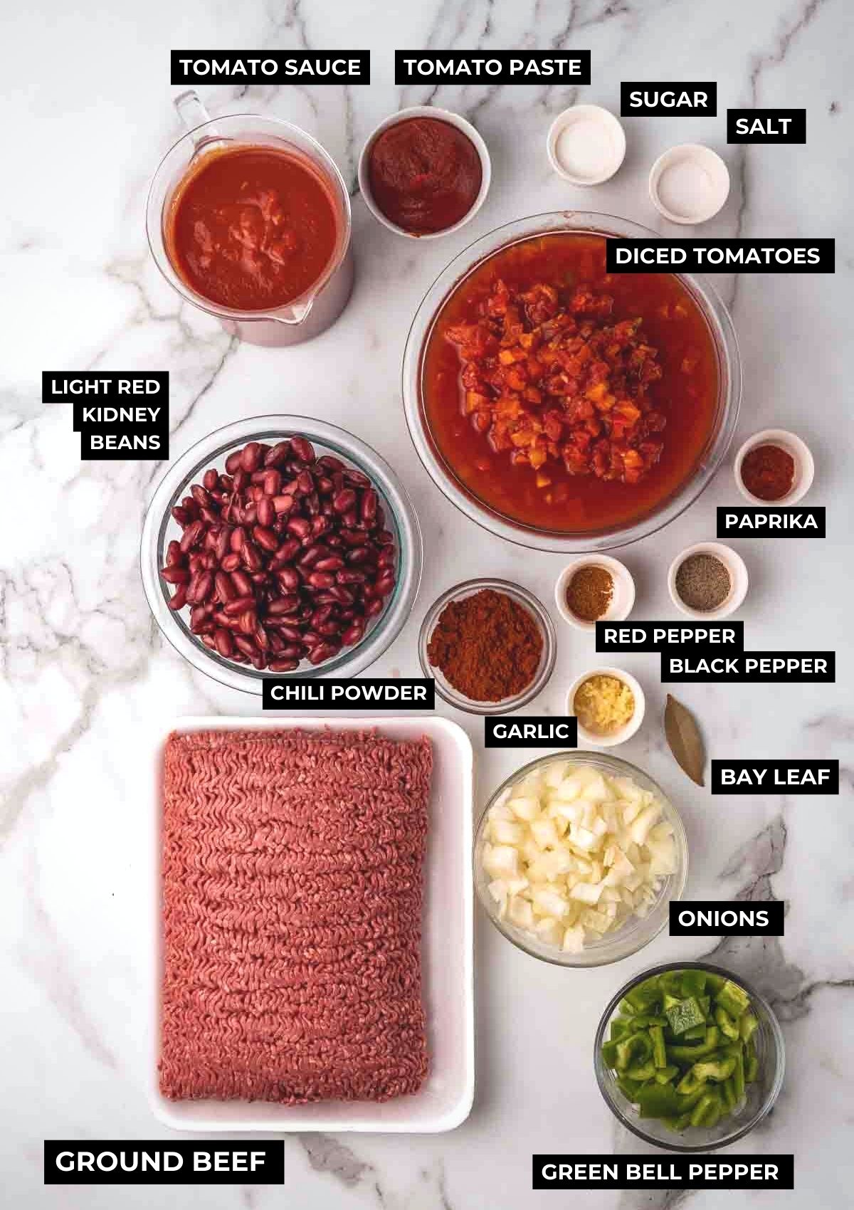 Ingredients for this slow cooker chili on a board. 