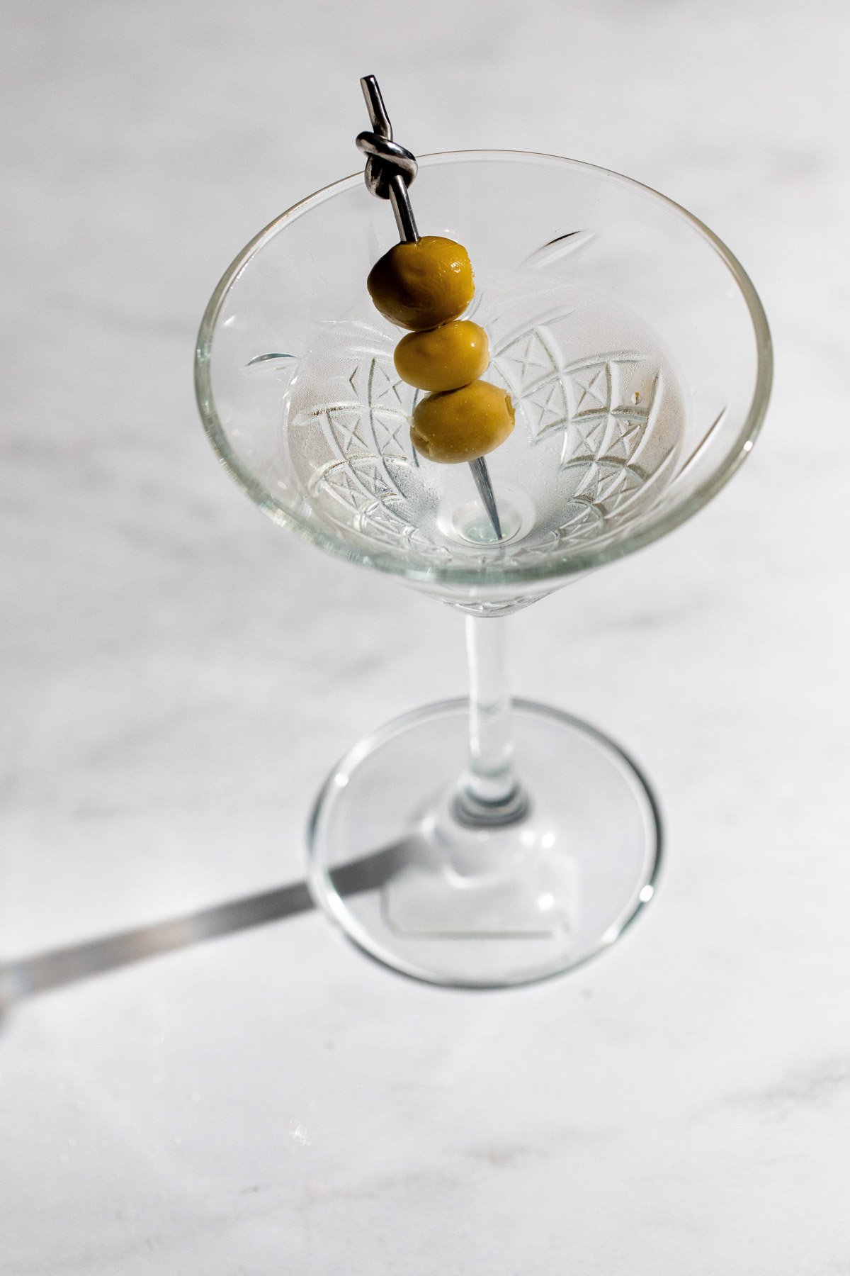 Classic dry gin martini in a crystal glass. 