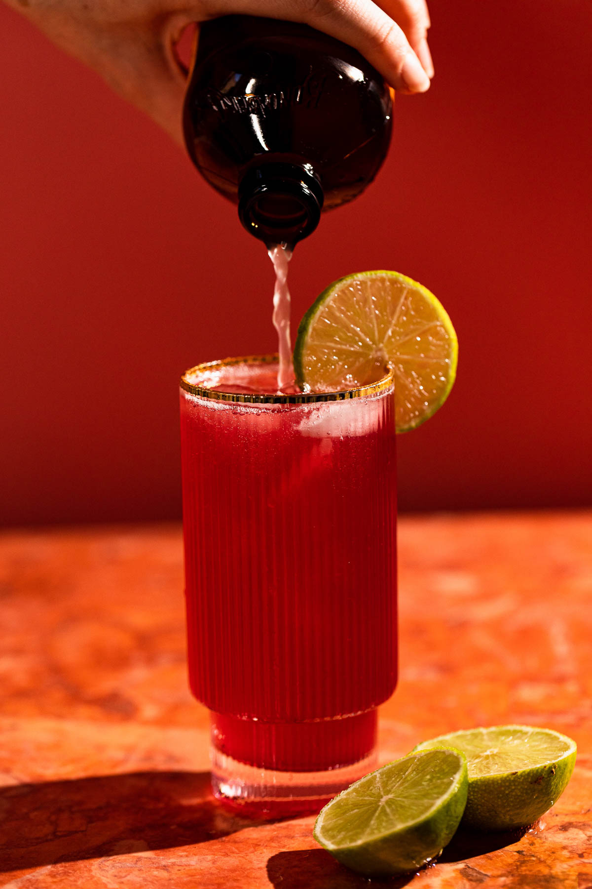 Top off the cocktail with ginger beer.