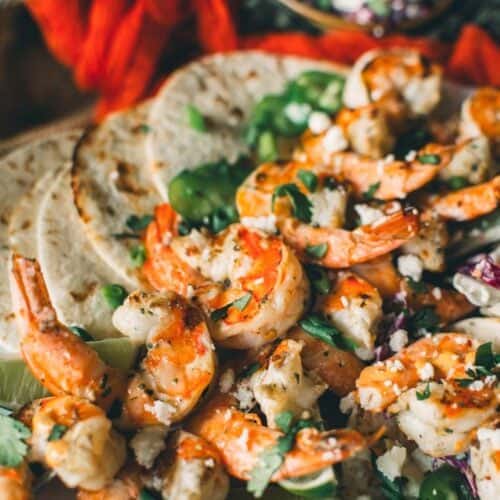 Shrimp piled onto a plate. 