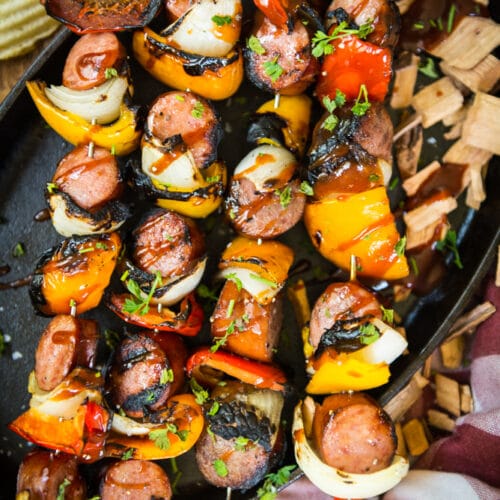 Overhead shot of sausage kabobs. 