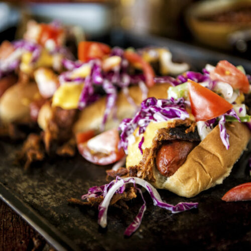 Pulled pork cheese dogs.