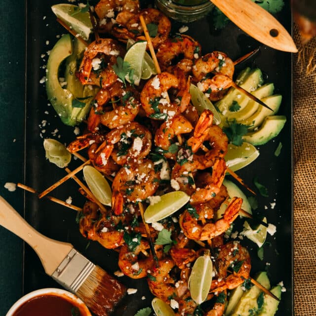 Shrimp skewers on a platter. 