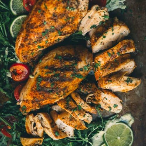 Chicken breasts on a platter. 